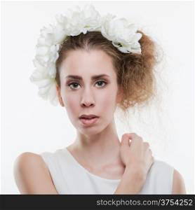 Beautiful tender woman wearing headpiece and white dress