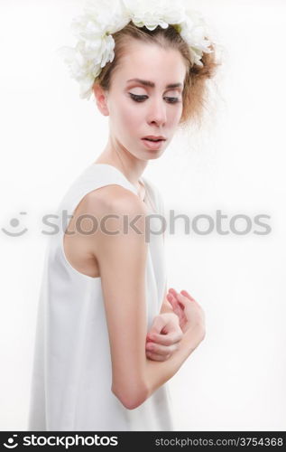 Beautiful tender woman wearing headpiece and white dress