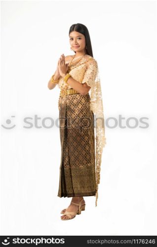 Beautiful Thai woman portrait dress up in traditional thai costume on white background. Thailand culture concept.