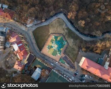 Beautiful top view of the ancient street Andrew’s Descent and the St. Andrew’s Church in Kyiv, Ukraine. Drone photo. St. Andrew’s church aerial top view in city Kiev, Ukraine