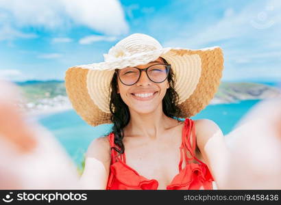 Beautiful tourist girl taking a selfie on the beach. Happy tourist girl taking a selfie on the beach of San Juan del Sur