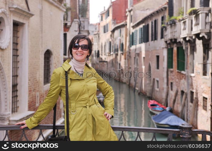 Beautiful tourist woman in Venice, exploring the old city