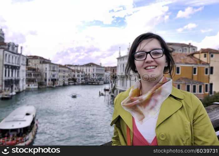 Beautiful tourist woman in Venice, exploring the old city