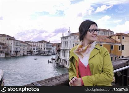 Beautiful tourist woman in Venice, exploring the old city