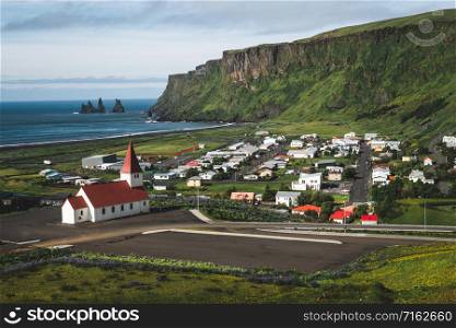 Beautiful town of Vik i Myrdal in Iceland in summer. The village of Vik is the southernmost village in Iceland on the ring road around 180 km southeast of Reykjavik.