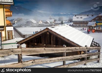 Beautiful traditional resort in Austrian Alps covered by snow