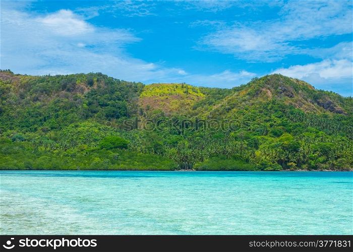 Beautiful tropical landscape - sea, sky and green mount