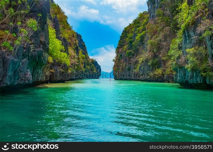 Beautiful tropical landscape with blue lagoon and mountain islands, El Nido, Palawan, Philippines