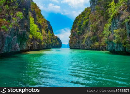 Beautiful tropical landscape with blue lagoon and mountain islands, El Nido, Palawan, Philippines