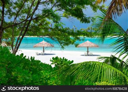Beautiful tropical Maldives island with beach