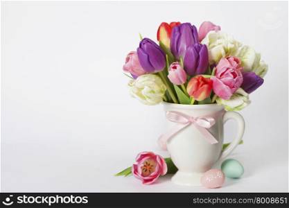 Beautiful tulips bouquet and easter eggs - spring, easter or gardening concept