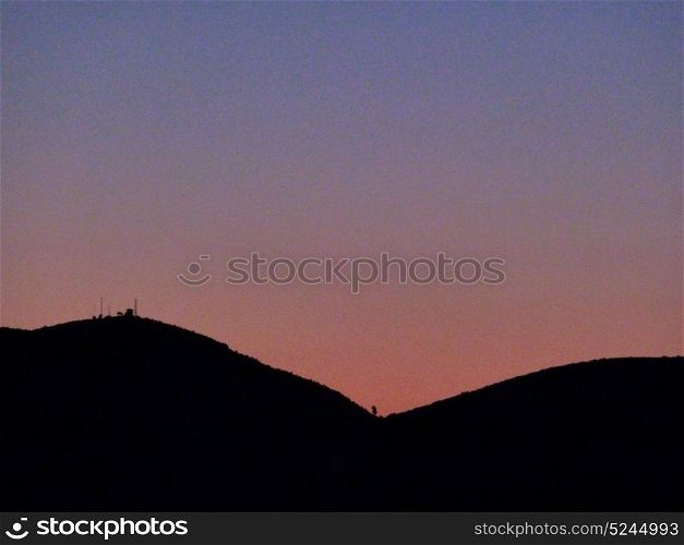 beautiful twilight sky over distant mountains