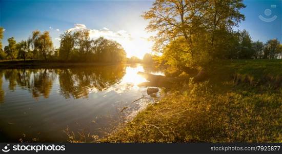 Beautiful ukrainian landscape of forest and river at sunset