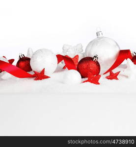 Beautiful various christmas decor on snow close-up