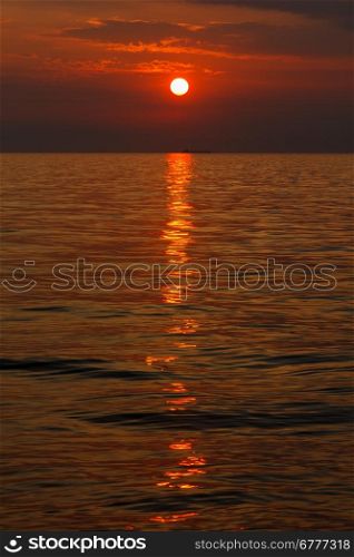 beautiful vibrant sunset over the sea, vertical shot
