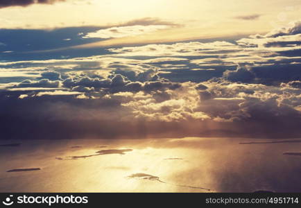 Beautiful view above clouds from the aircraft