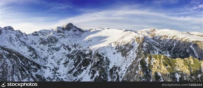 Beautiful view from drone to the snow mountain. Mountain peak Maliovica in Rila, Bulgaria