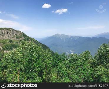 Beautiful view from the peak of Caucasus mountains. Roza Khutor, Russia