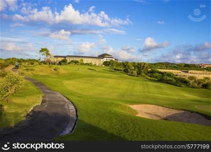 Beautiful View of Green Golf Field with Blue Sky.