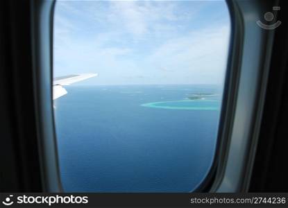 beautiful view of Maldives Island from airplane window