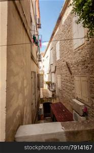 Beautiful view of old narrow street at city of Budva, Montenegro