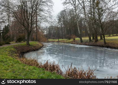 Beautiful view of river at park covered in ice