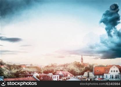 Beautiful view of scenic European old town with historic traditional german houses and roofs of old houses. Old town in Europe with sky, clouds at summer sunset. Panoramic view. Travels concept