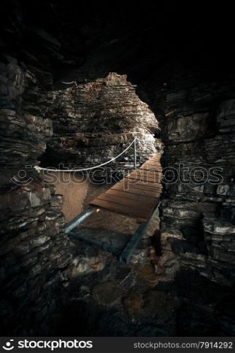 Beautiful view of sea grotto with wooden path