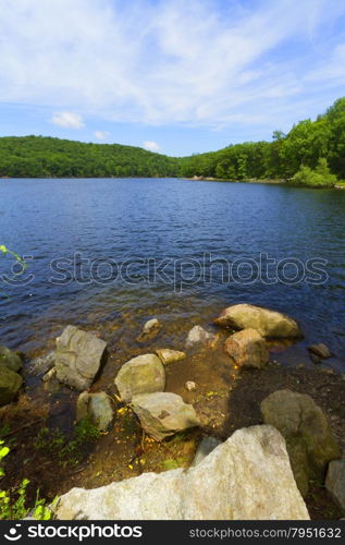 Beautiful view of sunset on the forest lake.. View of the sunset on the forest lake.