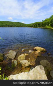 Beautiful view of sunset on the forest lake.. View of the sunset on the forest lake.