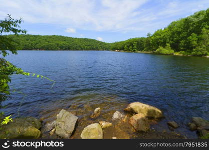 Beautiful view of sunset on the forest lake.. View of the sunset on the forest lake.