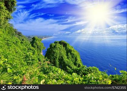 Beautiful view of the green island, sea and blue sky