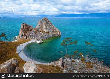 Beautiful View of the Sacred Siberian stone Shamanka at Cape Burhan, Olkhon Island on the island of Baikal, Siberia, Russia at the Bright Summer or Autumn Day