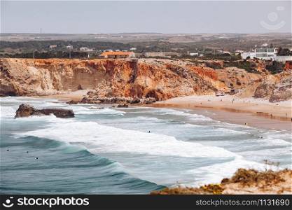 Beautiful view of the sea waves from the rocks in algarve, Portugal