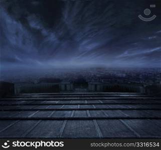 Beautiful view of town at night, Dark clouds over urban background
