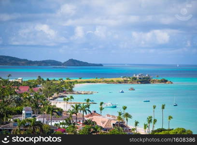 Beautiful view of tropical white beach in exotic island in the Caribbean Sea. Amazing Antigua island. Beautiful view of bay at tropical island in the Caribbean Sea