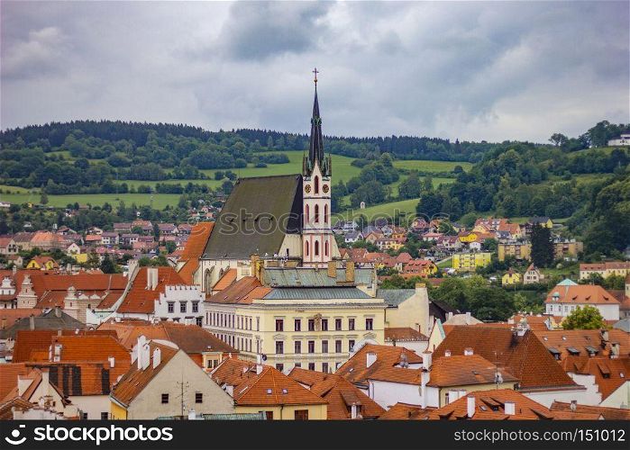 Beautiful view to church and castle in Cesky Krumlov, Czech repu. Beautiful view to church and castle in Cesky Krumlov, Czech republic. Beautiful view to church and castle in Cesky Krumlov, Czech republic