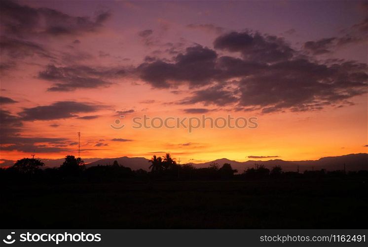Beautiful views of the sunset over the rice fields at countryside.