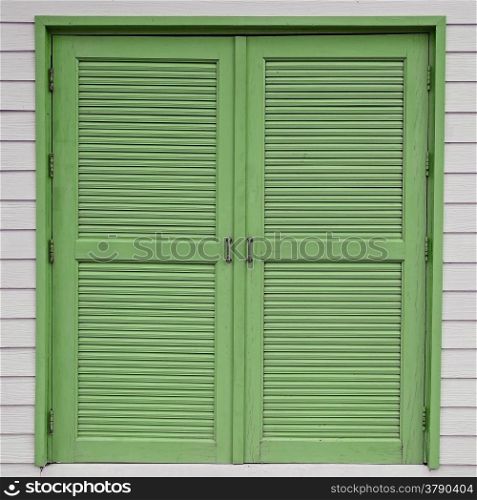 Beautiful vintage wooden window on a white wood background