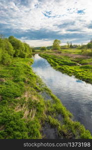 Beautiful water scenery in the setting sun, near the village of Mikhailovskoye, Ivanovo oblast, Russia.