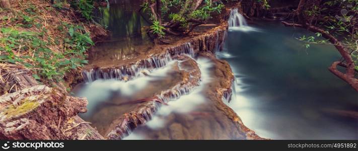 Beautiful waterfall in rainforest, Kanchanaburi province, Southeast asia, Thailand