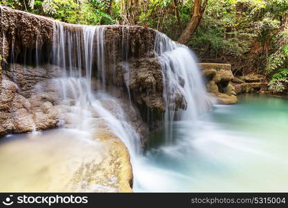 Beautiful waterfall in rainforest, Kanchanaburi province, Southeast asia, Thailand