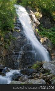 beautiful waterfall in Val di sole, Trentino, Italy