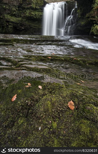 Beautiful waterfall landscape image in forest during Autumn Fall