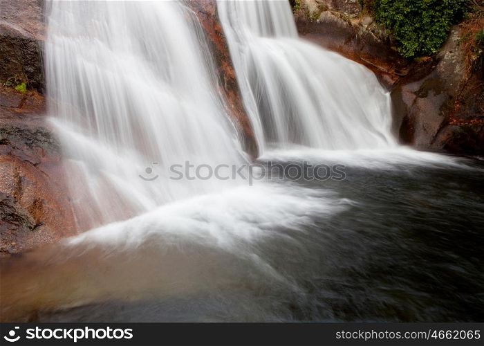 Beautiful waterfall located in a mountain of Spain