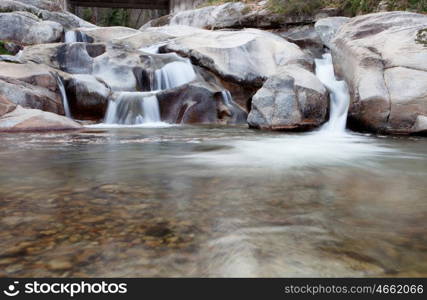 Beautiful waterfall located in a mountain of Spain