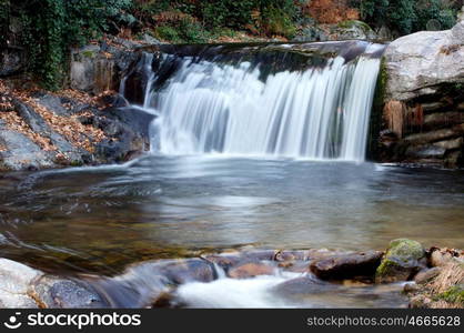 Beautiful waterfall located in a mountain of Spain