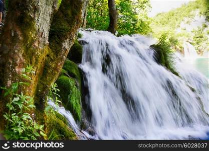 beautiful waterfalls on slopes of mountains