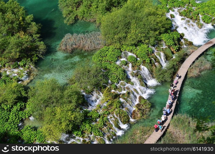 beautiful waterfalls on slopes of mountains