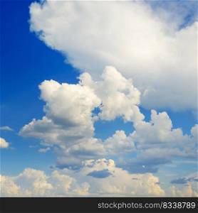 Beautiful white clouds on bright blue sky